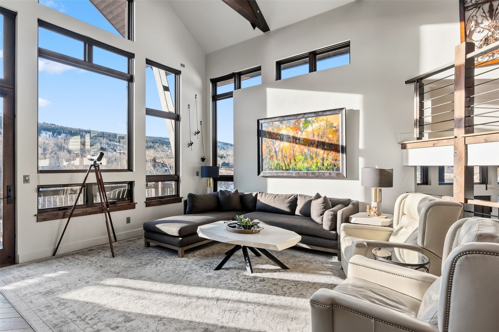 240 Game Trail Road Silverthorne, CO 80498 - Photo 5 of 49 a living room with furniture and a large window