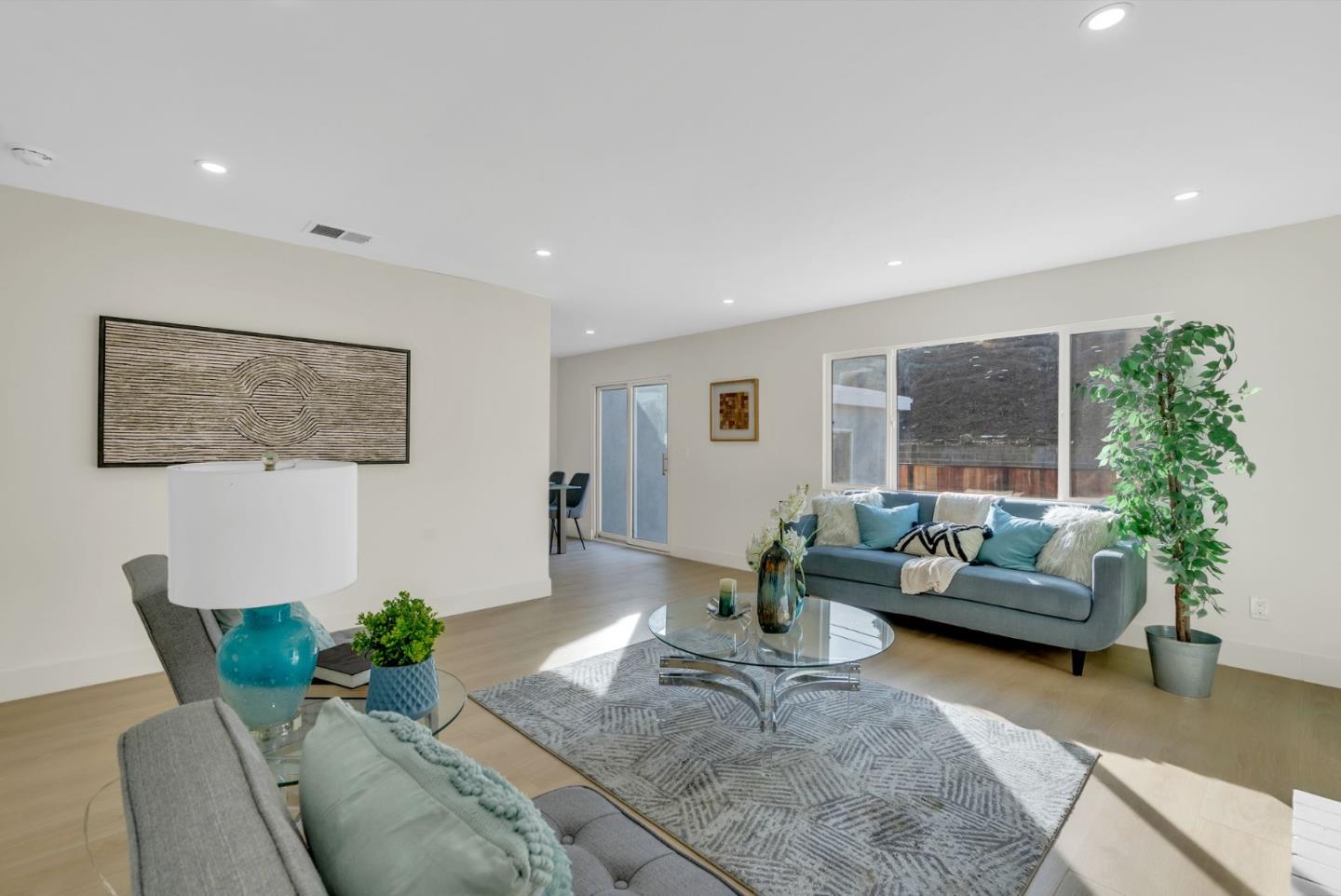 2011 Willow Way San Bruno, CA 94066 - Photo 11 of 57 a living room with furniture and a large window
