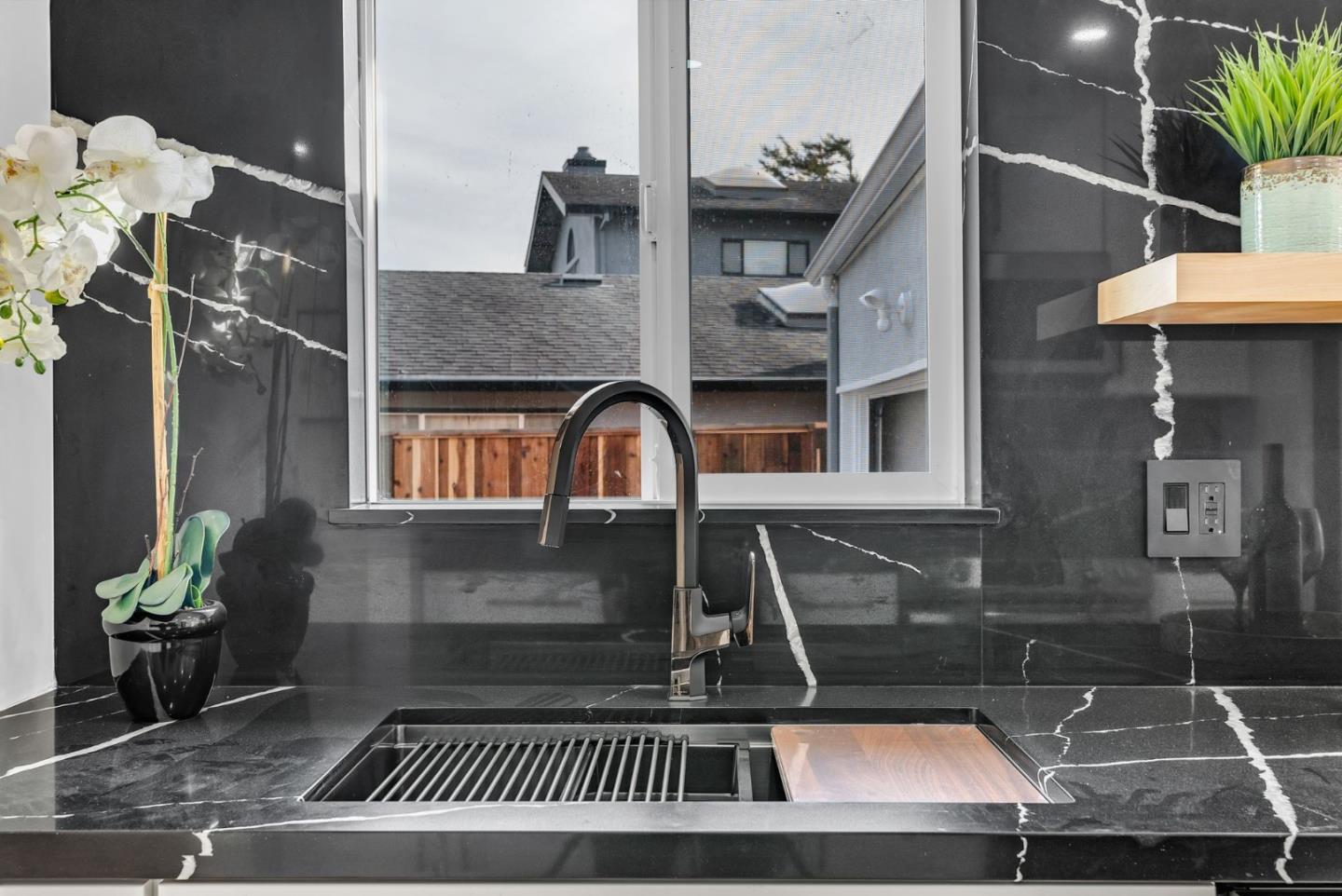 2011 Willow Way San Bruno, CA 94066 - Photo 16 of 57 a kitchen with a sink and a stove