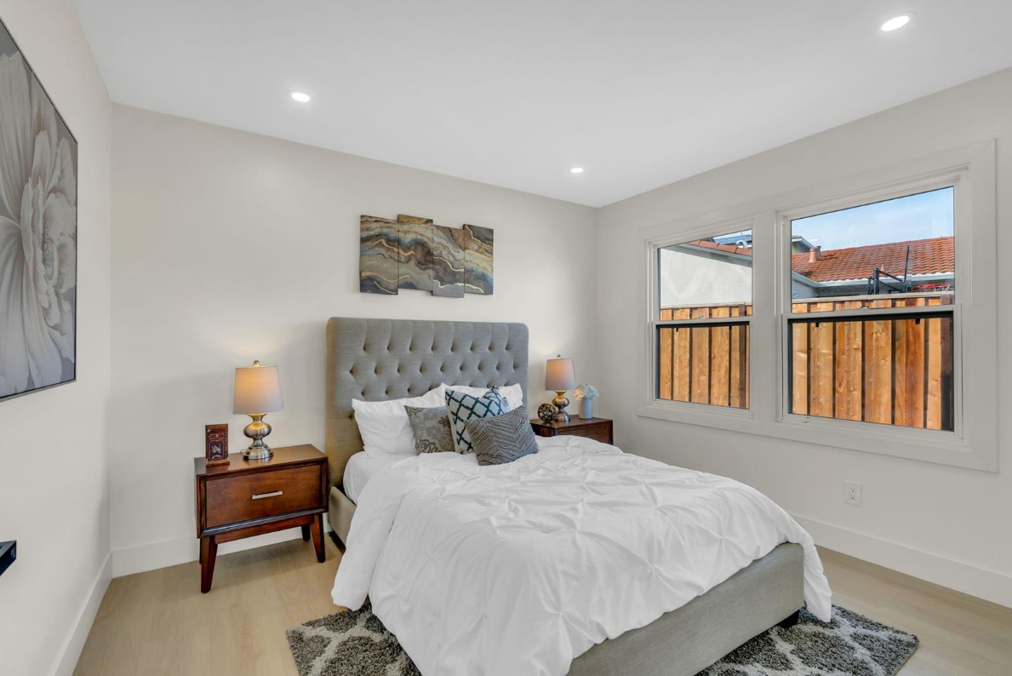 2011 Willow Way San Bruno, CA 94066 - Photo 25 of 57 a bedroom with a bed and a window