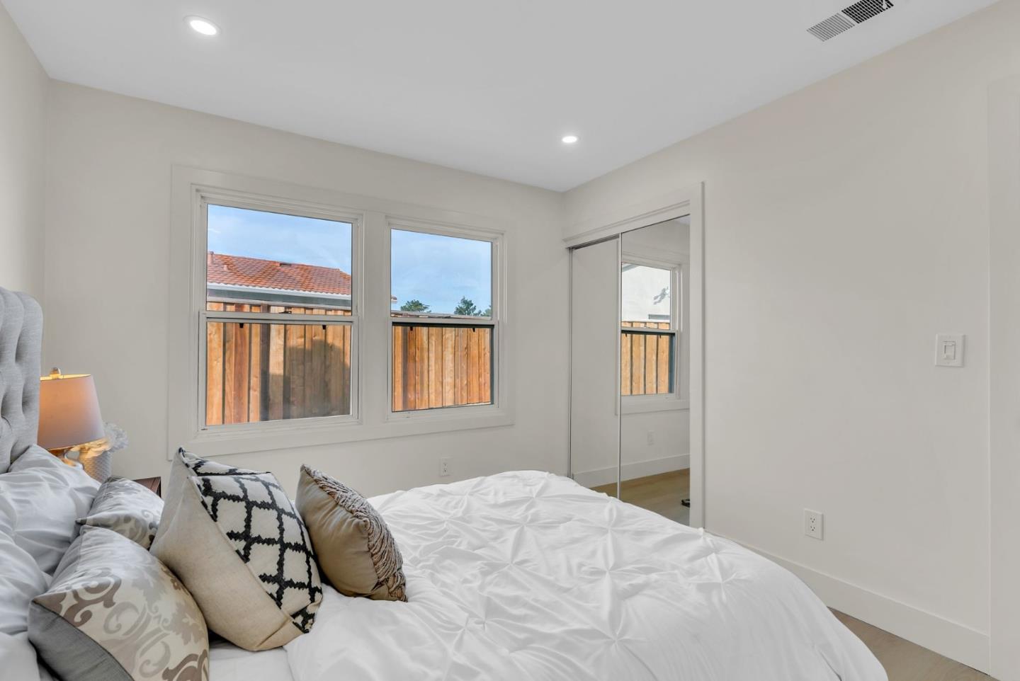 2011 Willow Way San Bruno, CA 94066 - Photo 26 of 57 a bedroom with a bed and wooden floor