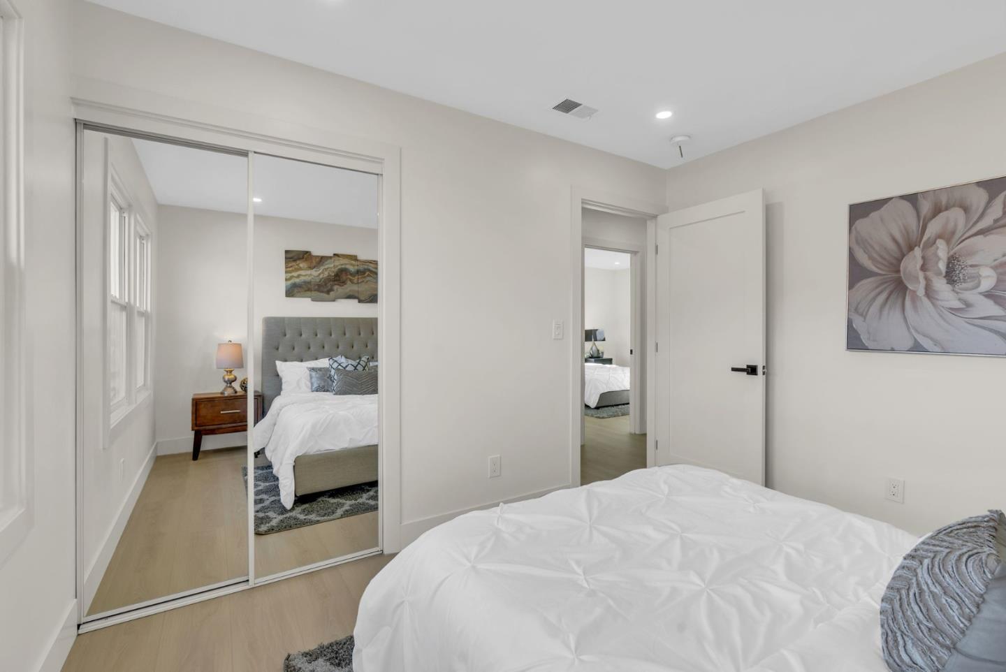 2011 Willow Way San Bruno, CA 94066 - Photo 27 of 57 a bedroom with a bed and a couch