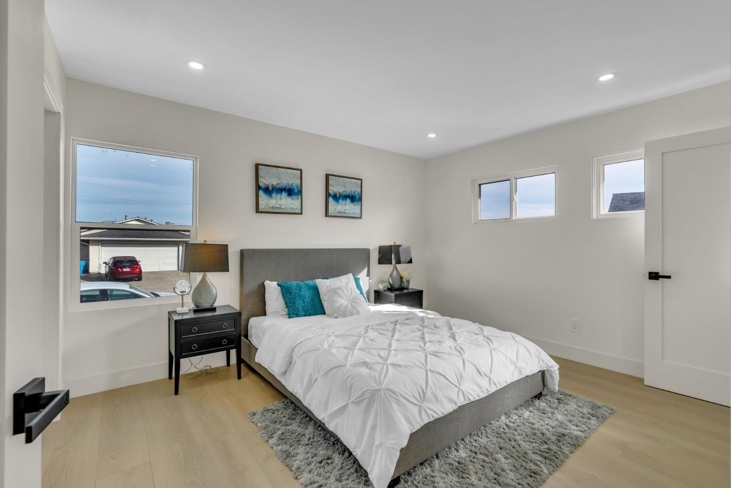 2011 Willow Way San Bruno, CA 94066 - Photo 29 of 57 a bedroom with a bed and a desk