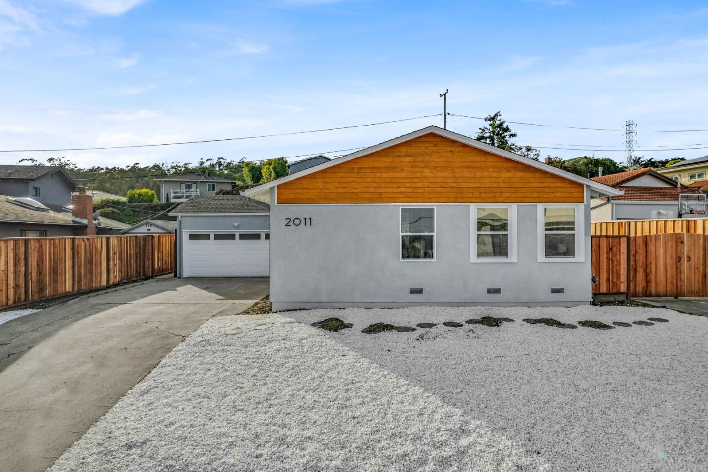 2011 Willow Way San Bruno, CA 94066 - Photo 3 of 57 a backyard of a house with yard and outdoor seating