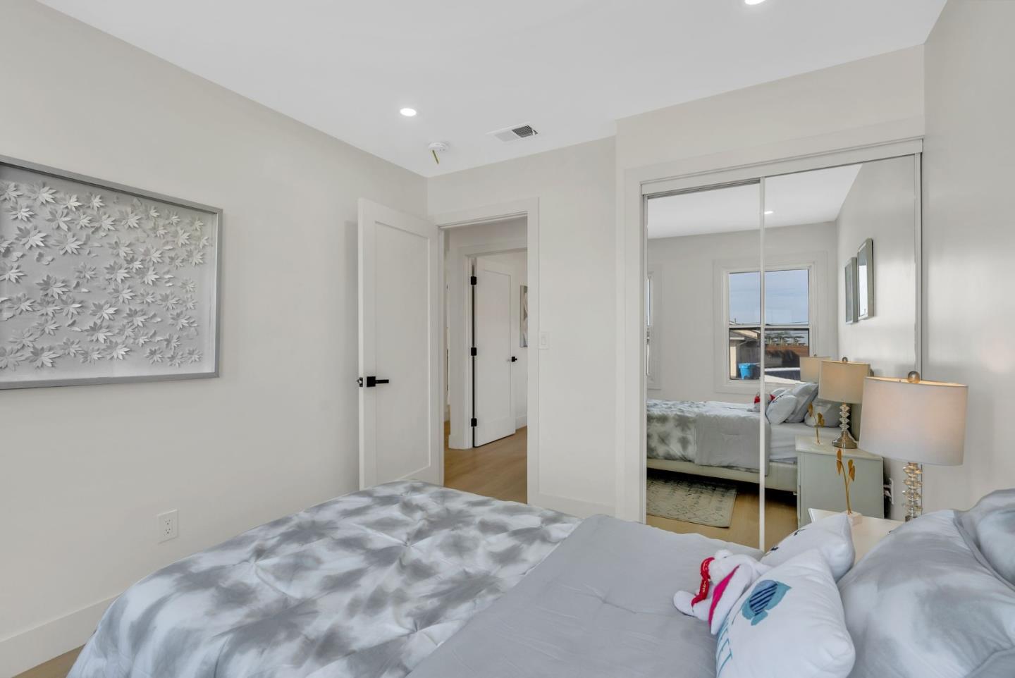 2011 Willow Way San Bruno, CA 94066 - Photo 33 of 57 a bedroom with a bed and a view of living room