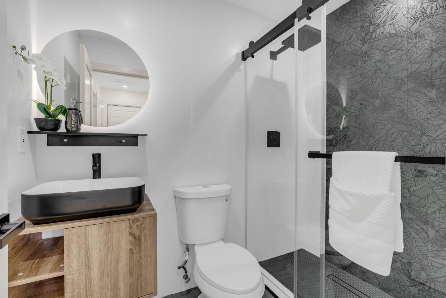 2011 Willow Way San Bruno, CA 94066 - Photo 35 of 57 a bathroom with a sink a toilet and a mirror