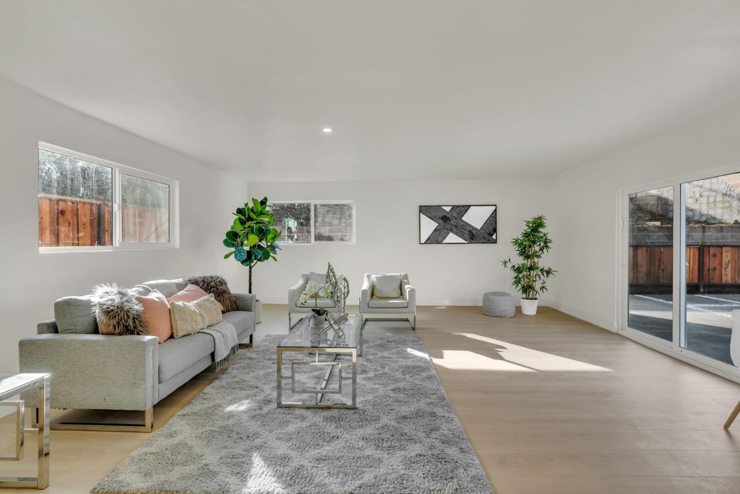 2011 Willow Way San Bruno, CA 94066 - Photo 41 of 57 a living room with furniture potted plant and a window