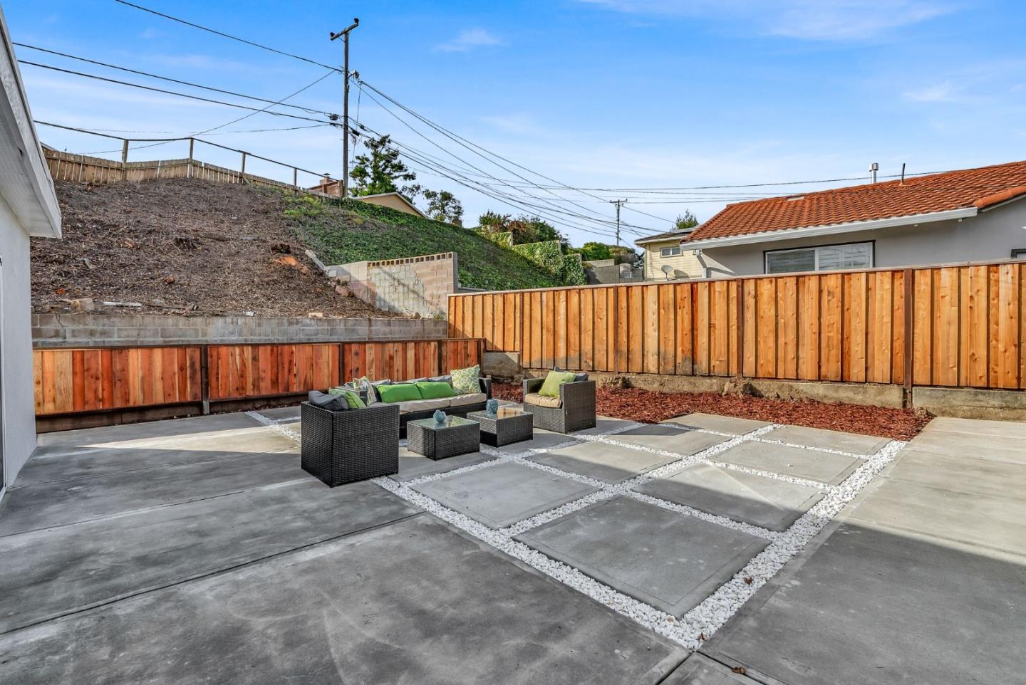 2011 Willow Way San Bruno, CA 94066 - Photo 42 of 57 a view of a patio with a table and chairs