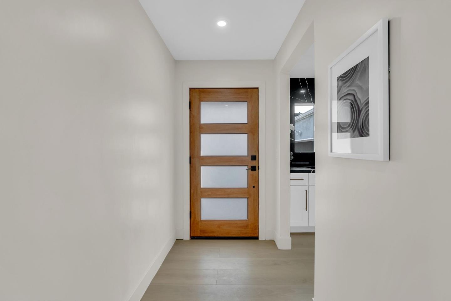 2011 Willow Way San Bruno, CA 94066 - Photo 6 of 57 a view of an empty room with closet and windows