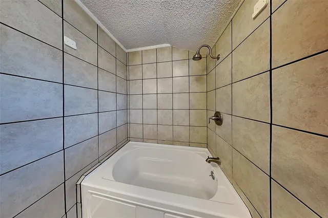 a bathroom with a bathtub