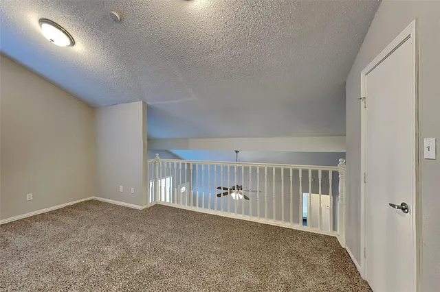 a view of a hallway with entryway