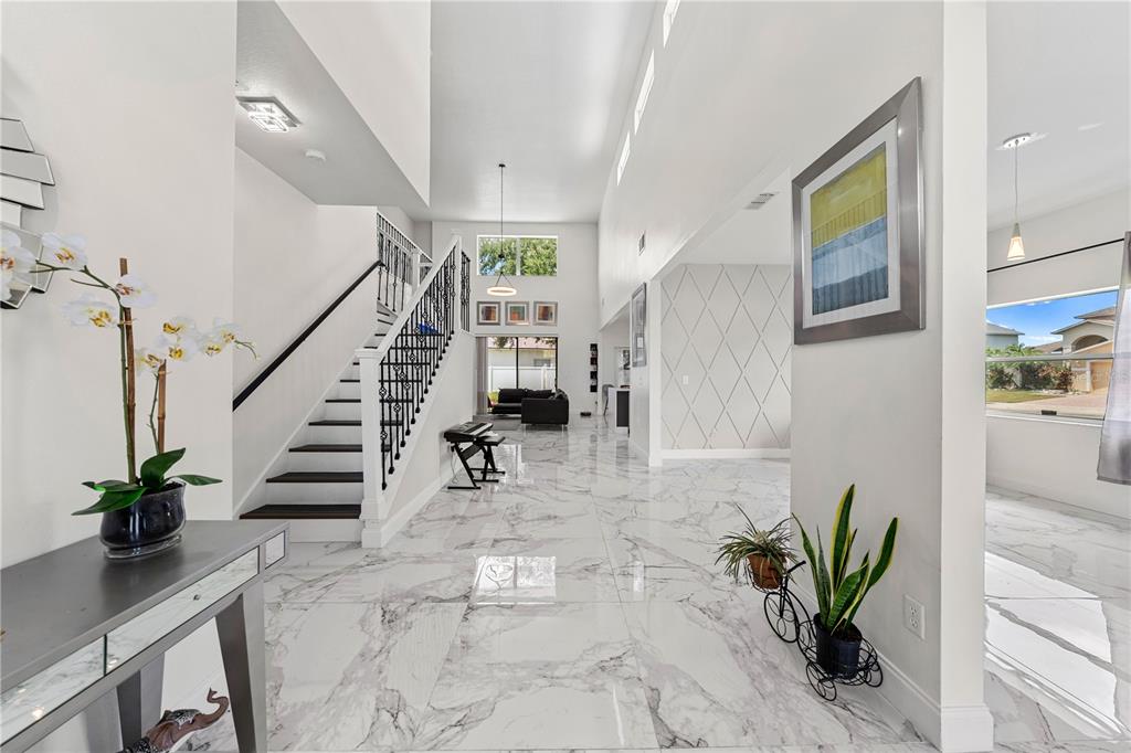 4301 Presidio Way Kissimmee, FL 34746 - Photo 2 of 50 a view of entryway with wooden floor