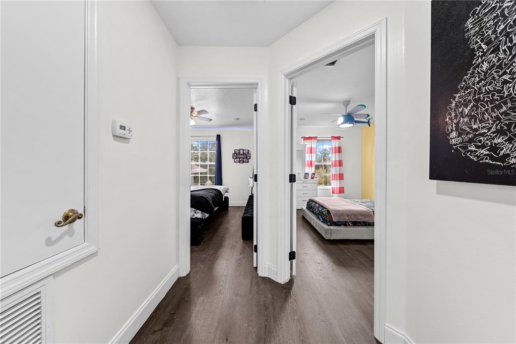 4301 Presidio Way Kissimmee, FL 34746 - Photo 33 of 50 a en suite bathroom with a tub and a view of bedroom