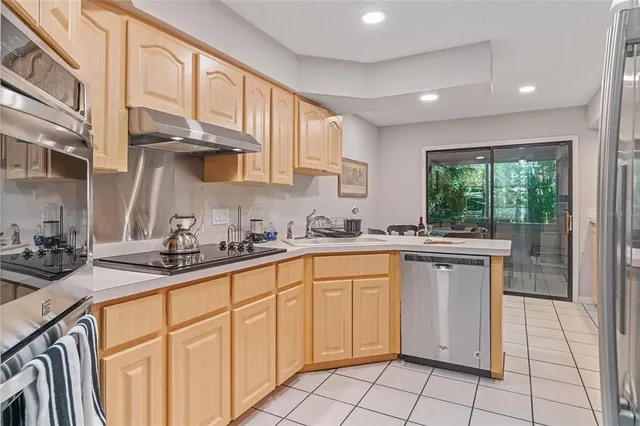 a spacious bedroom with a bed and window