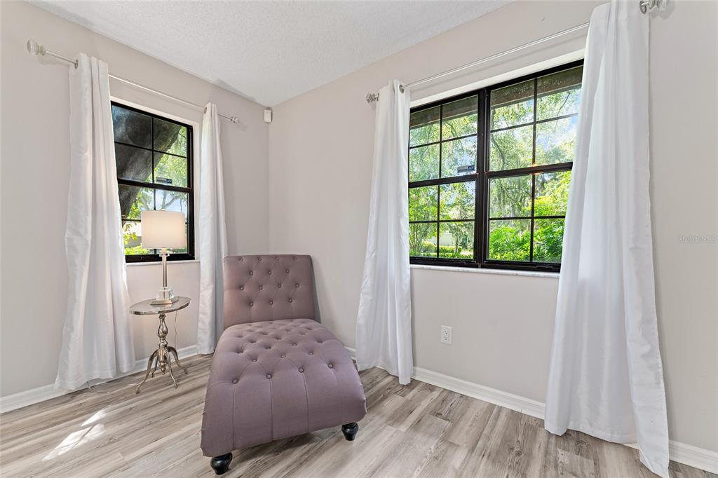 8101 Northwest 46th Street Ocala, FL 34482 - Photo 38 of 71 a living room with furniture and a window