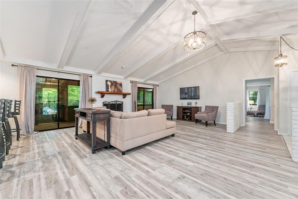 8101 Northwest 46th Street Ocala, FL 34482 - Photo 10 of 71 a living room with furniture and a large window