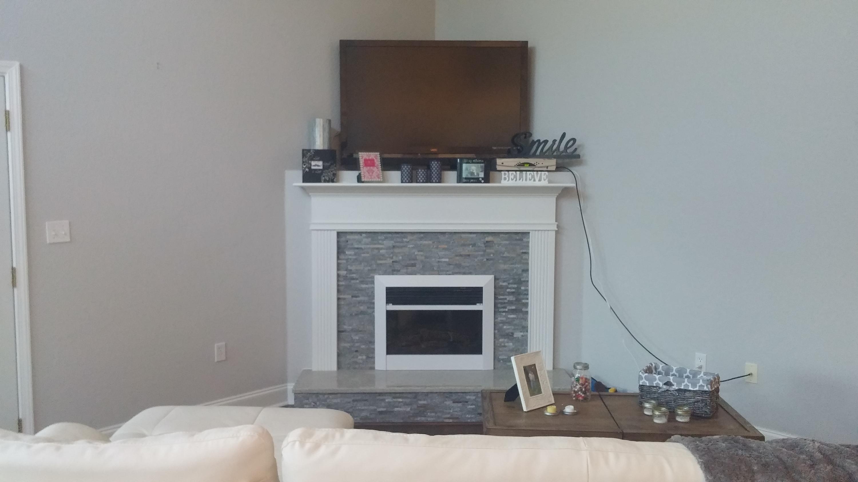 175 Loblolly Bay Drive Santa Rosa Beach, FL 32459 - Photo 1 of 11 a living room with a fireplace