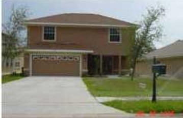 175 Loblolly Bay Drive Santa Rosa Beach, FL 32459 - Photo 2 of 11 a front view of a house with a yard