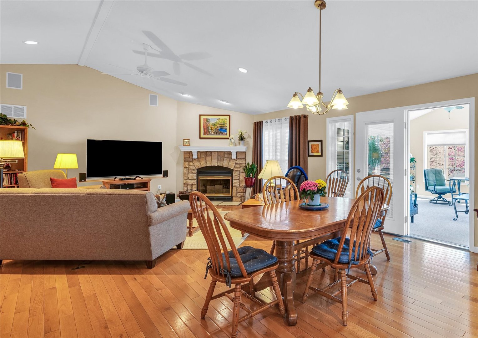 3204 Ridge Park Road Urbana, IL 61802 - Photo 11 of 56 a view of a dining room with furniture wooden floor and chandelier