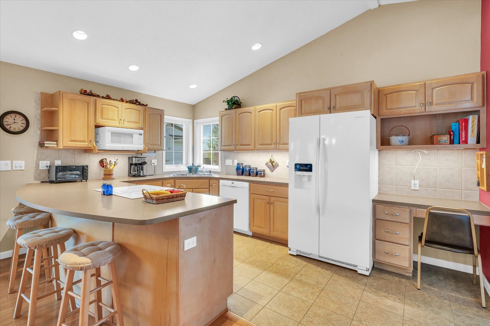 3204 Ridge Park Road Urbana, IL 61802 - Photo 14 of 56 a kitchen with refrigerator and cabinets