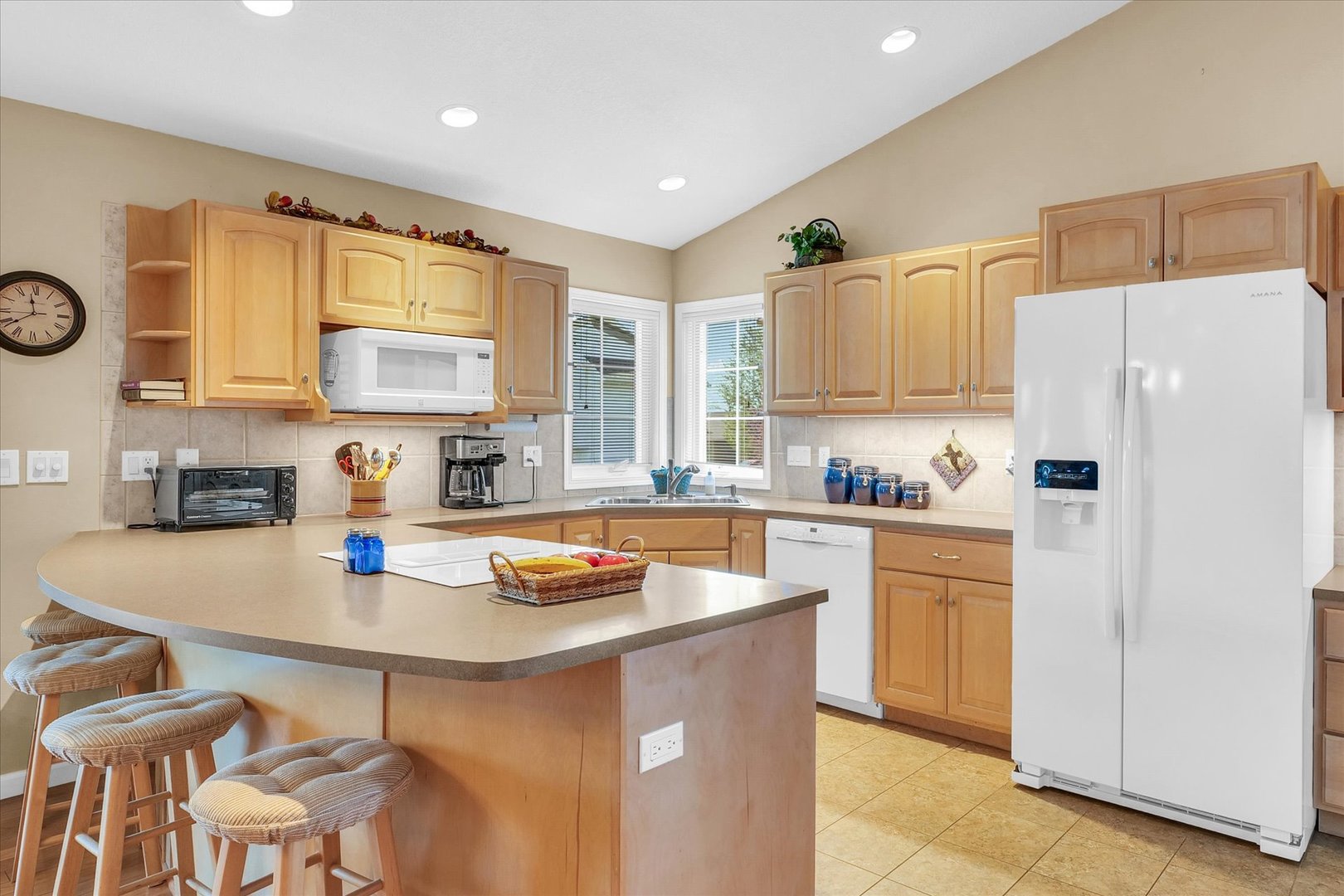 3204 Ridge Park Road Urbana, IL 61802 - Photo 15 of 56 a kitchen with stainless steel appliances granite countertop a refrigerator sink and cabinets
