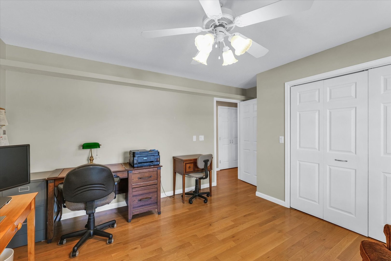 3204 Ridge Park Road Urbana, IL 61802 - Photo 25 of 56 a workspace with furniture window and wooden floor