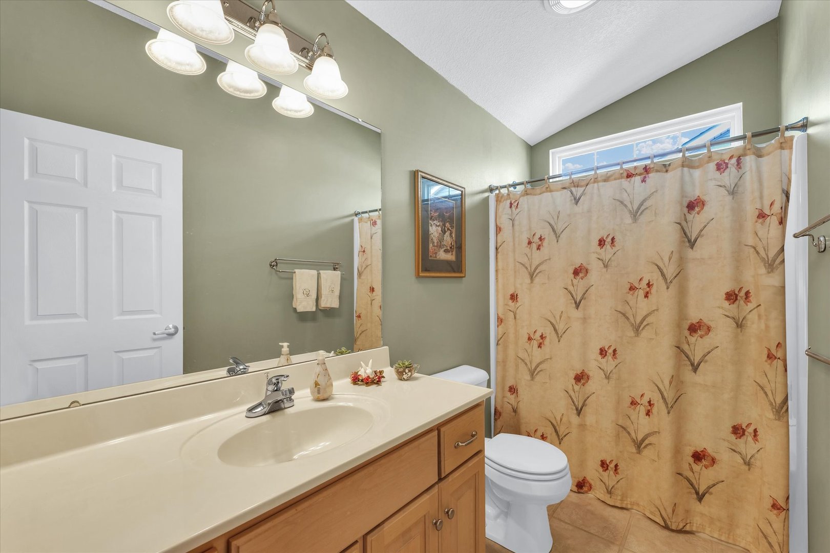 3204 Ridge Park Road Urbana, IL 61802 - Photo 26 of 56 a bathroom with a sink a toilet and a mirror
