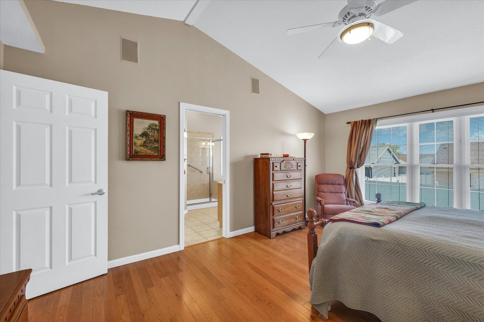 3204 Ridge Park Road Urbana, IL 61802 - Photo 30 of 56 a bedroom with a large bed and a large window