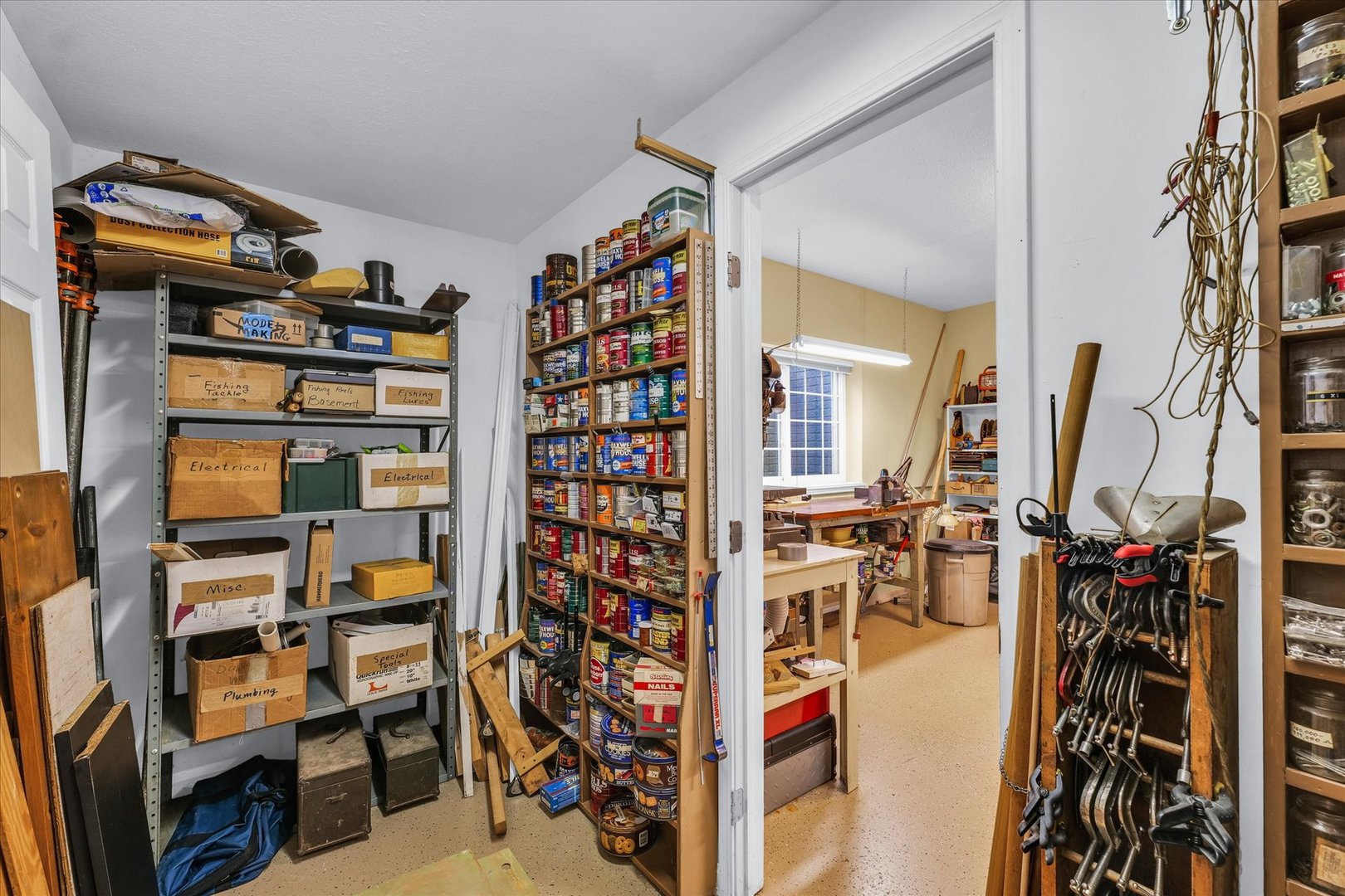 3204 Ridge Park Road Urbana, IL 61802 - Photo 47 of 56 a view of walk in closet with clothes and shoes
