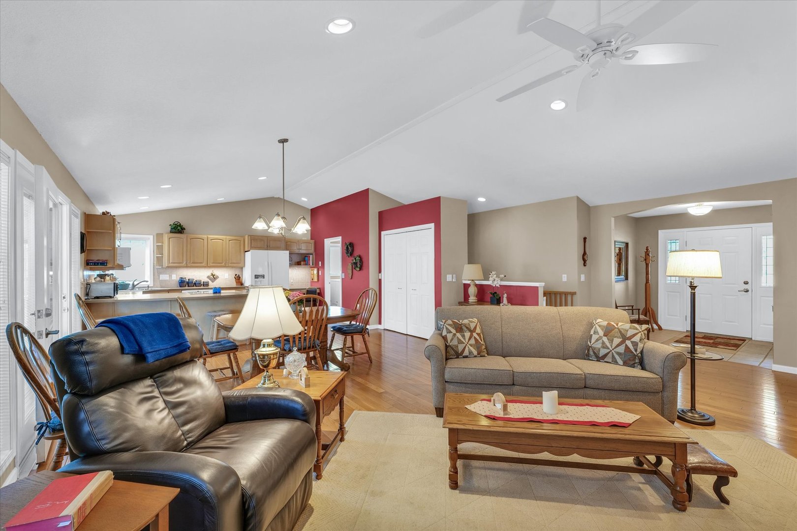 3204 Ridge Park Road Urbana, IL 61802 - Photo 10 of 56 a living room with furniture kitchen view and a chandelier