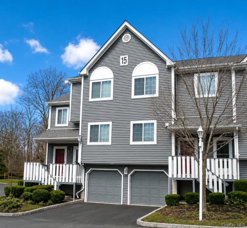 88 Eagle Ridge Way Nanuet, NY 10954 - Photo 1 of 16 a front view of a house with a yard