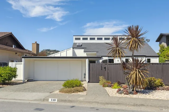 front view of a house with a street