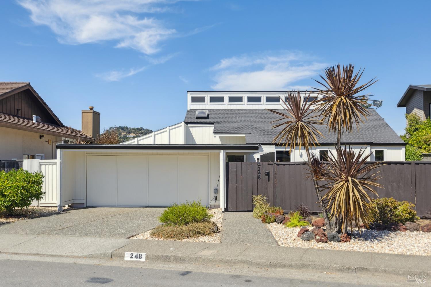 front view of a house with a street