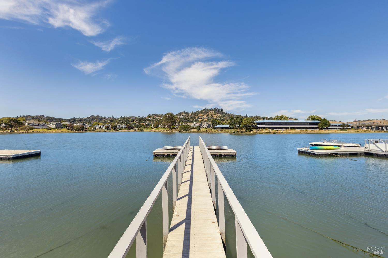 248 Riviera Circle Larkspur, CA 94939 - Photo 2 of 2 a view of a lake with houses in the back
