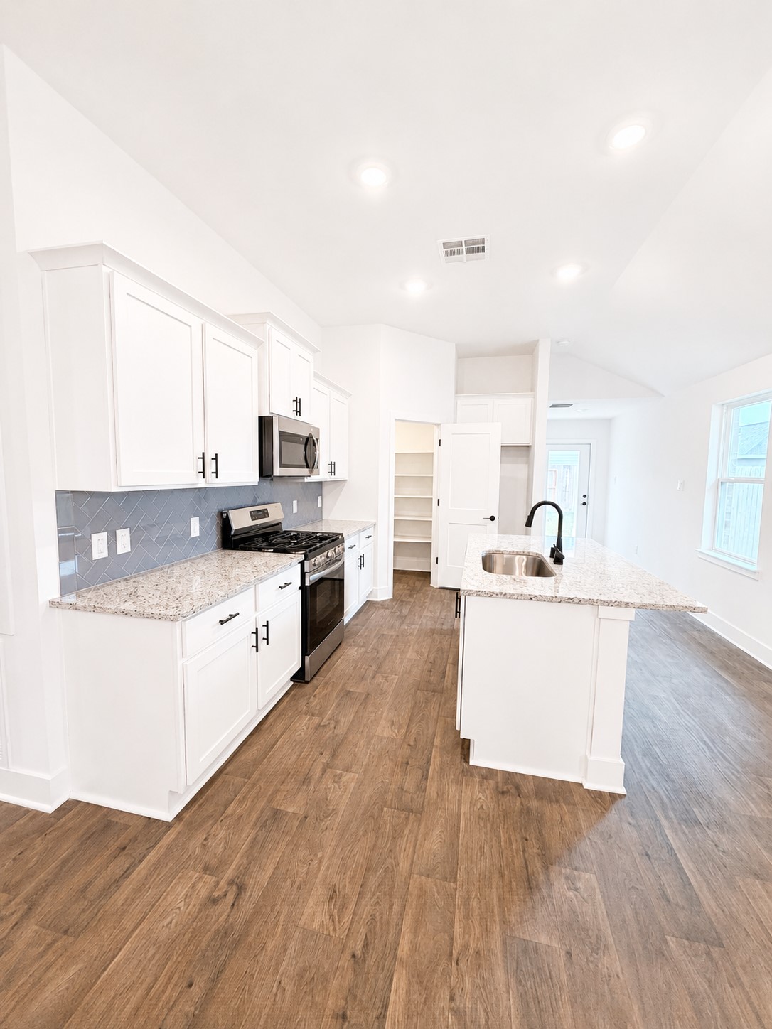 9476 Hard Rock Road Conroe, TX 77303 - Photo 4 of 17 View of Kitchen from Dining Area