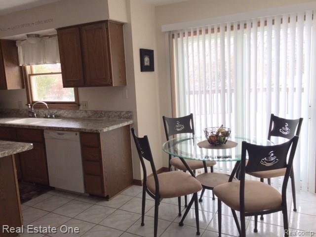 6070 Ormond Road White Lake, MI 48383 - Photo 11 of 36 BREAKFAST NOOK & DOORWAY OUT TO DECK
