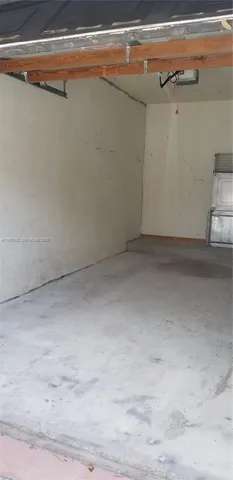 a car parked in front of a house