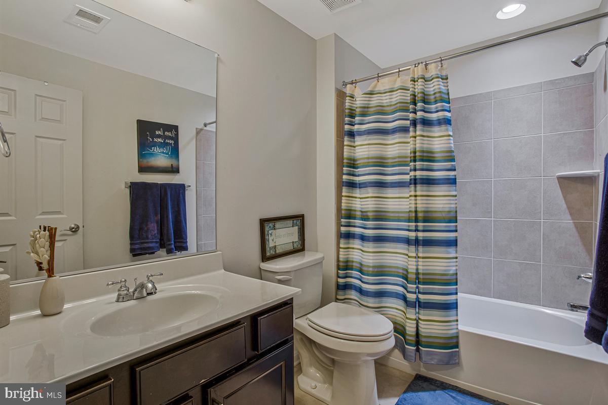 8704 Alexa Road Clinton, MD 20735 - Photo 37 of 42 Full bath with tub and shower