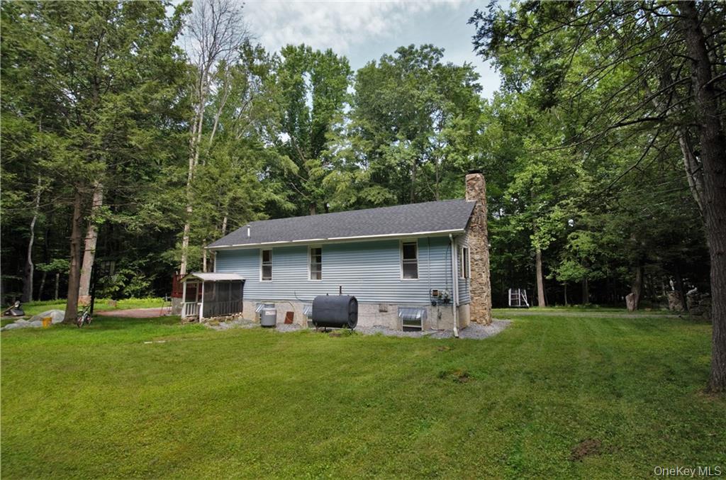 16 Woodland Road Middletown, NY 10940 - Photo 13 of 13 Back of house featuring a lawn