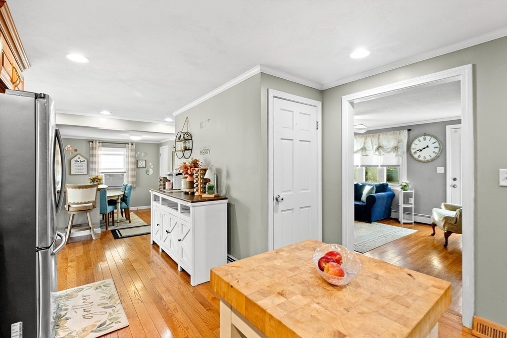 35 Memorial Drive Methuen, MA 01844 - Photo 13 of 42 a kitchen with stainless steel appliances kitchen island granite countertop a refrigerator and stove