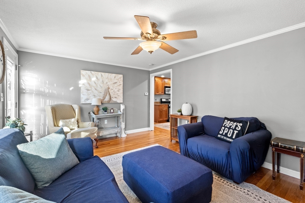 35 Memorial Drive Methuen, MA 01844 - Photo 19 of 42 a living room with furniture and a large window