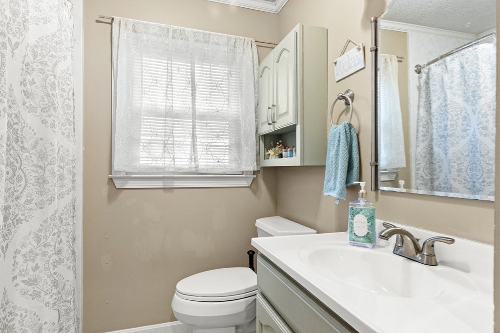 35 Memorial Drive Methuen, MA 01844 - Photo 20 of 42 a bathroom with a sink toilet and shower