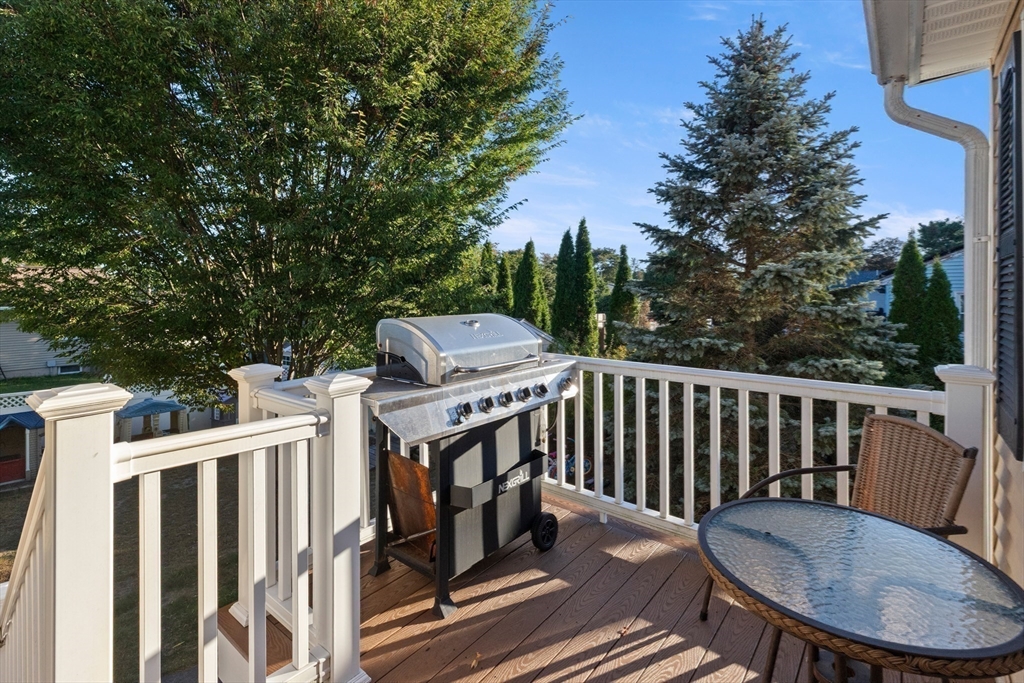 35 Memorial Drive Methuen, MA 01844 - Photo 34 of 42 a view of a chair and table in the balcony