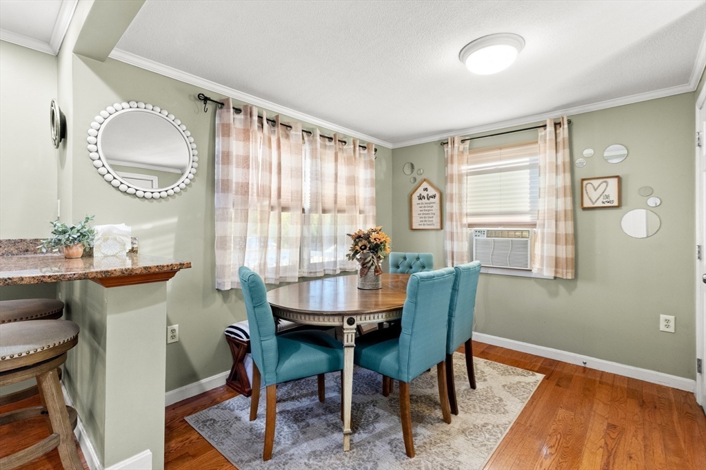 35 Memorial Drive Methuen, MA 01844 - Photo 7 of 42 a dining room with furniture and window