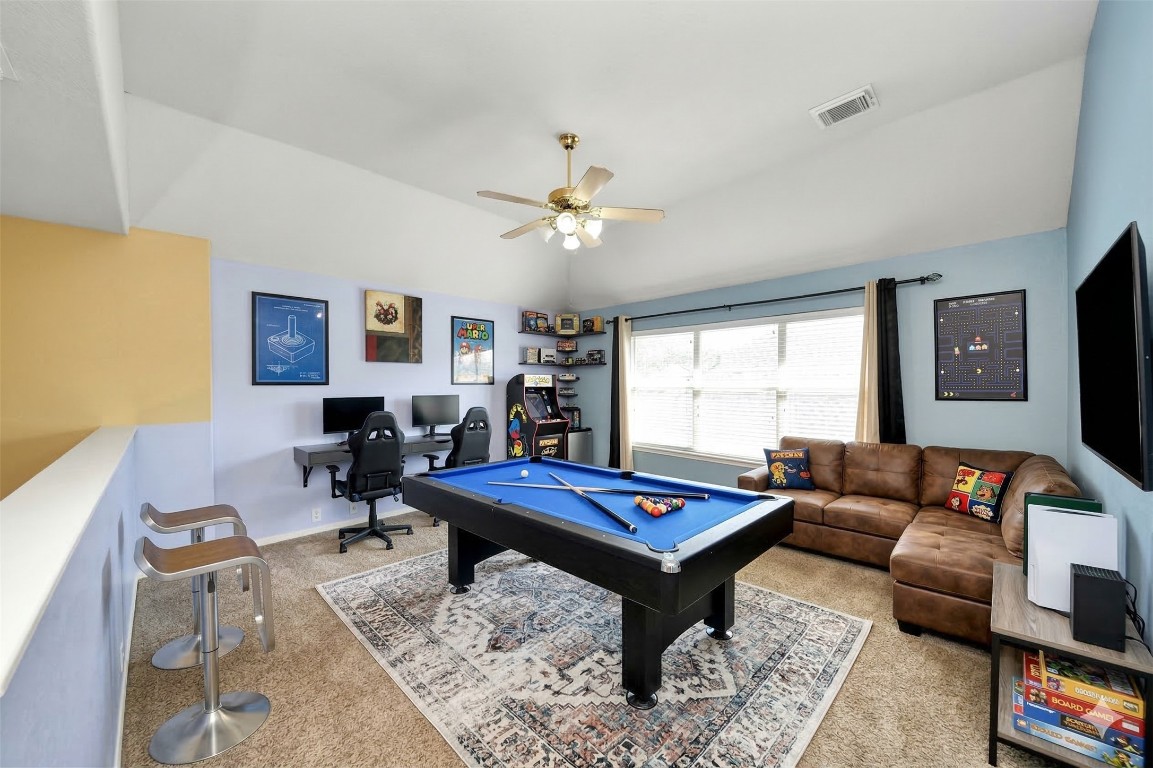 13635 Treebank Lane Houston, TX 77070 - Photo 18 of 26 a living room with furniture and a large window