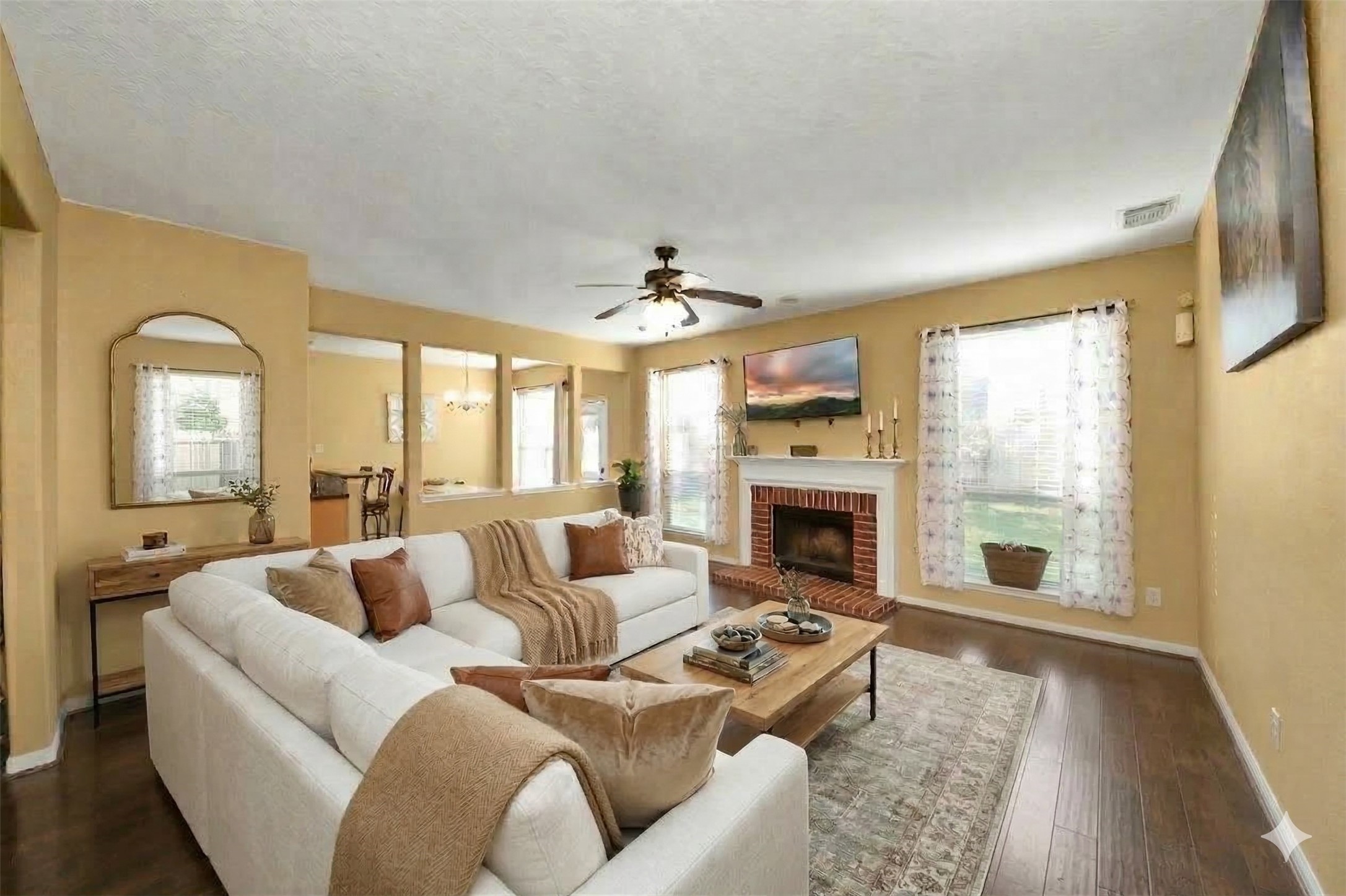 13635 Treebank Lane Houston, TX 77070 - Photo 3 of 26 a living room with furniture fireplace and a large window