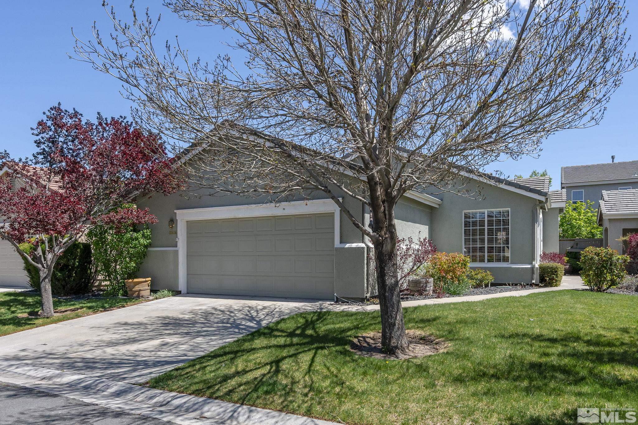 10414 Rockport Lane Reno, NV 89521 - Photo 1 of 22 a front view of a house with garden