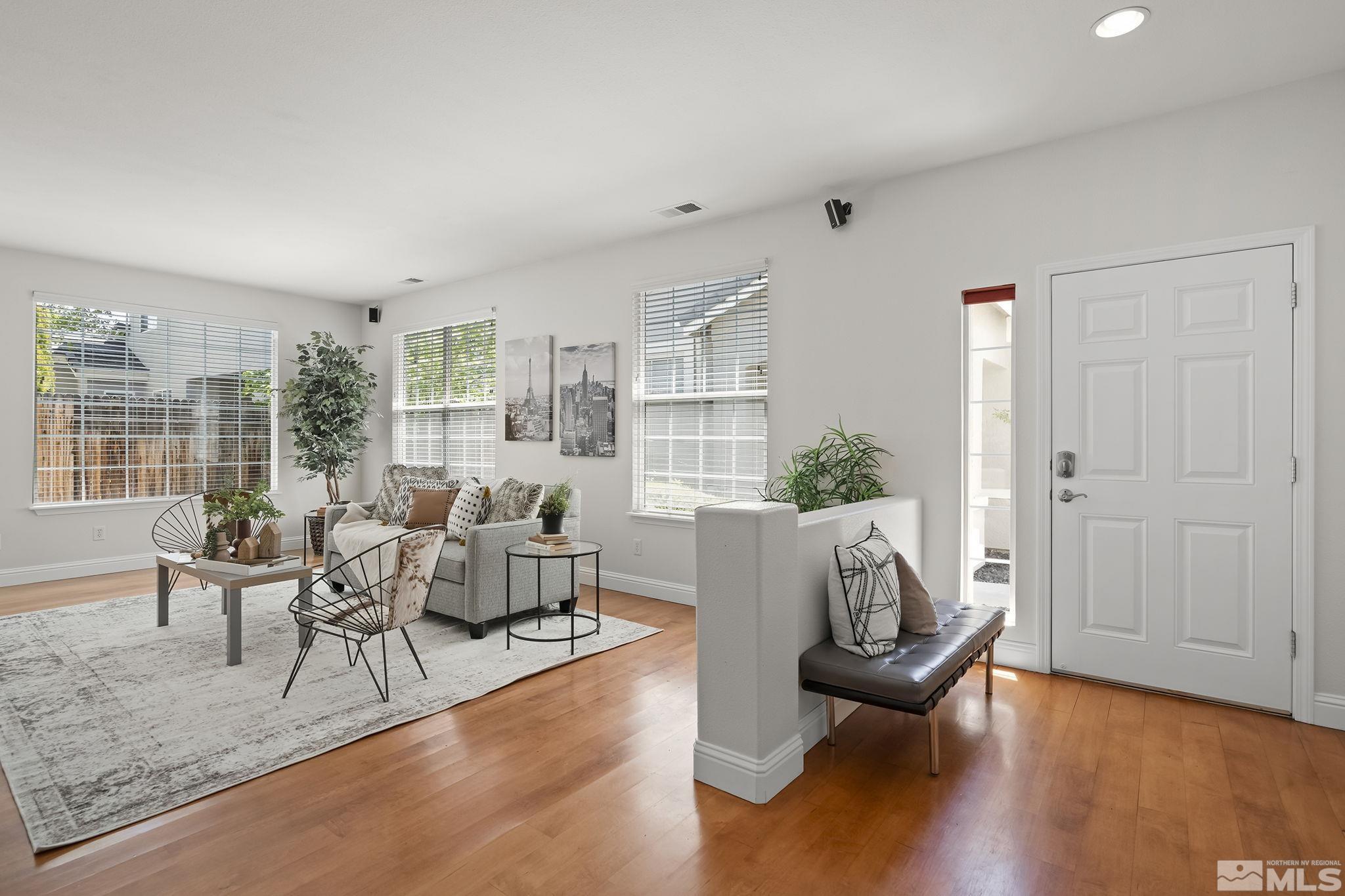 10414 Rockport Lane Reno, NV 89521 - Photo 5 of 22 a living room with furniture and a large window