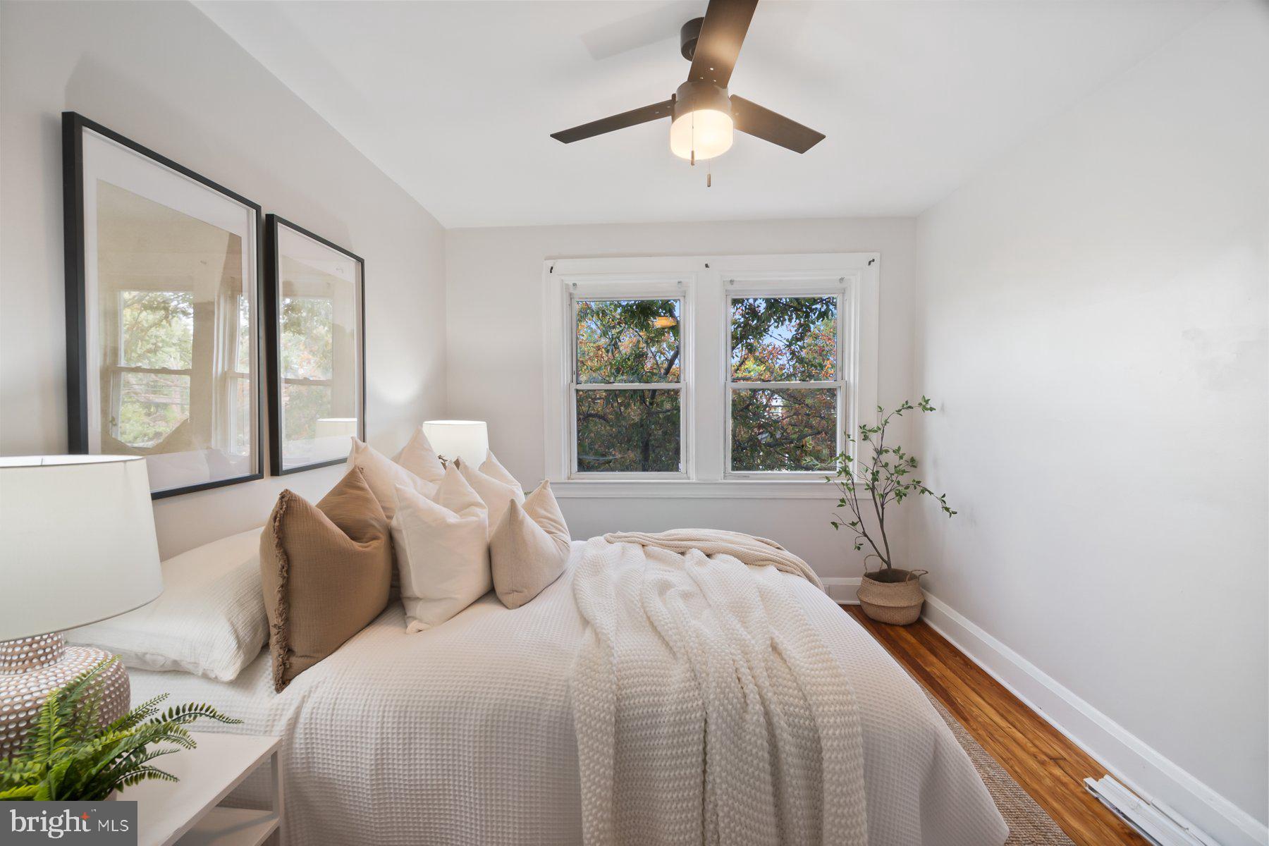 101 Willow Spring Road Dundalk, MD 21222 - Photo 15 of 28 a bedroom with a large bed and a window