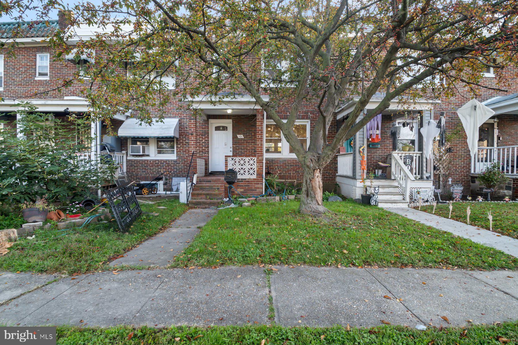 101 Willow Spring Road Dundalk, MD 21222 - Photo 2 of 28 a front view of a house with garden and trees